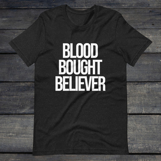 A photo of the Blood Bought Believer Tee. This tee is heather gray with white text that reads blood bought believer.